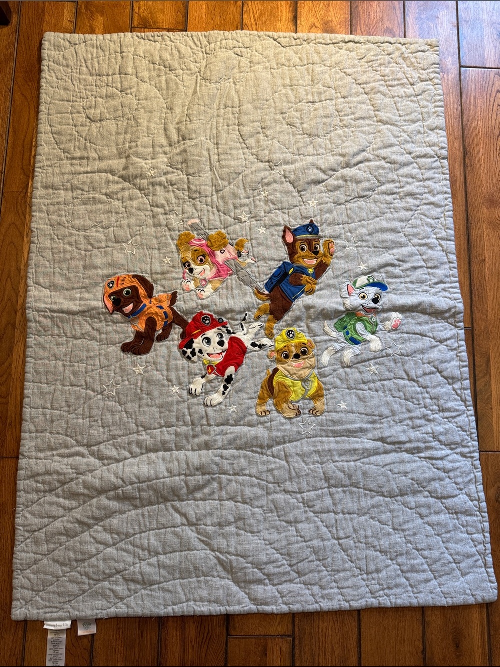 Pottery Barn Kids Light Gray Quilt with Colorful Paw Patrol Appliqués